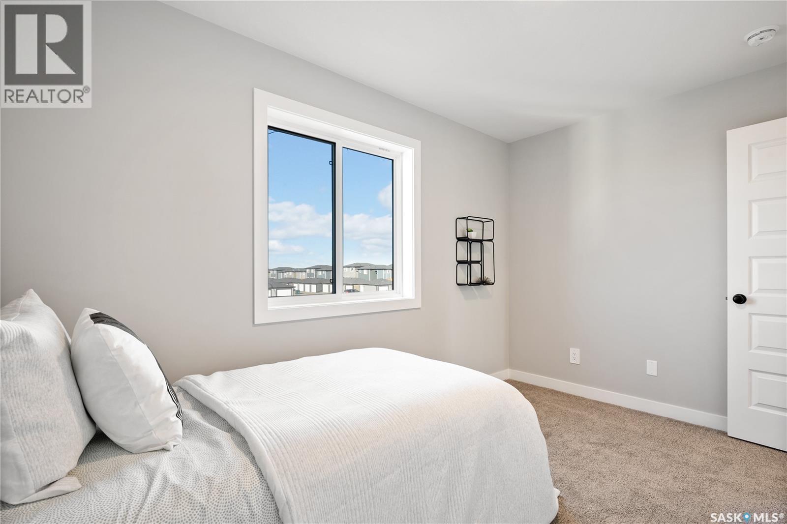 10 Vancouver Crescent, Pilot Butte, SK - Indoor Photo Showing Bedroom