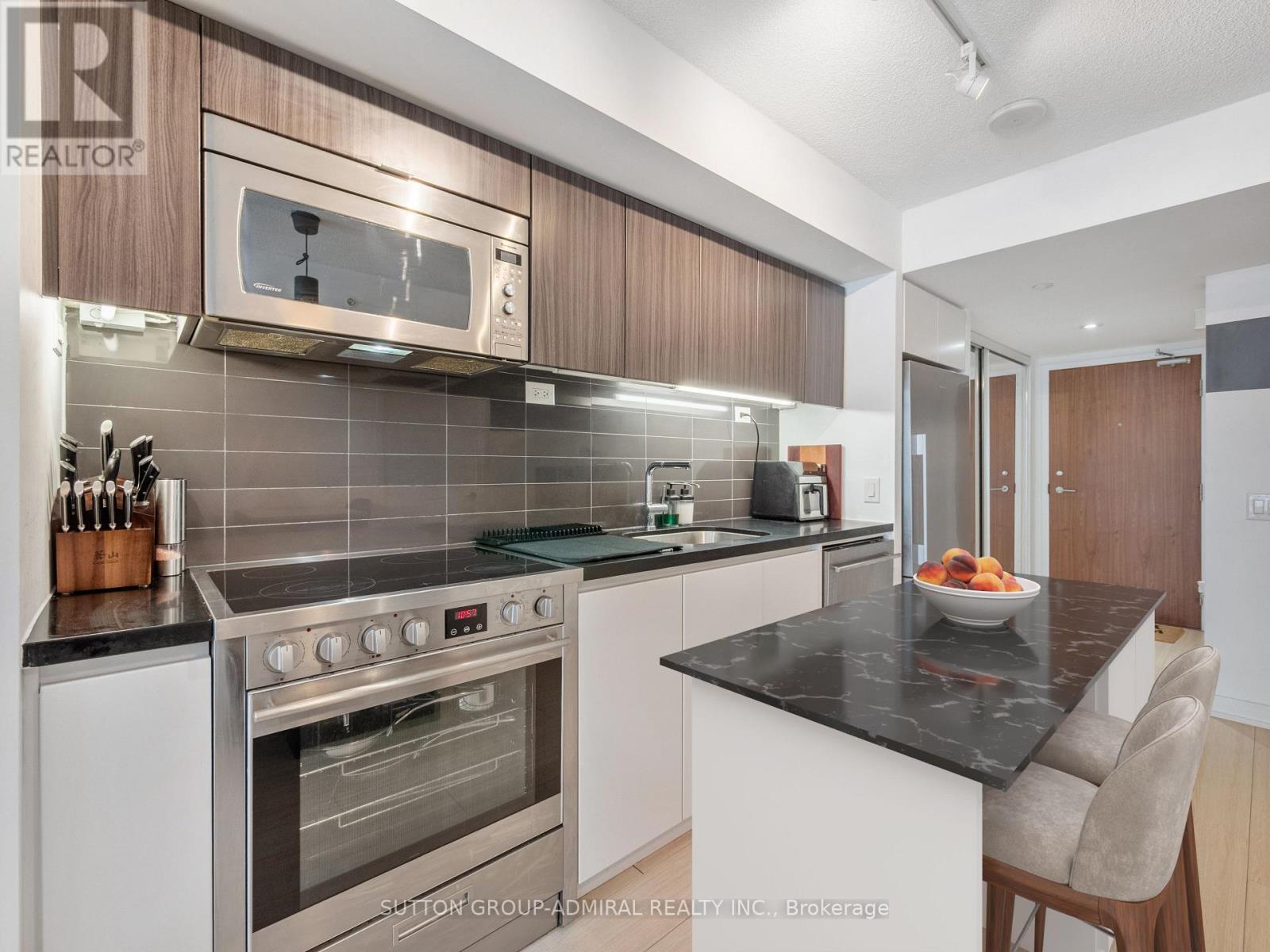Virtually Staged Photo - 315 - 75 Queens Wharf Road, Toronto, ON - Indoor Photo Showing Kitchen With Upgraded Kitchen
