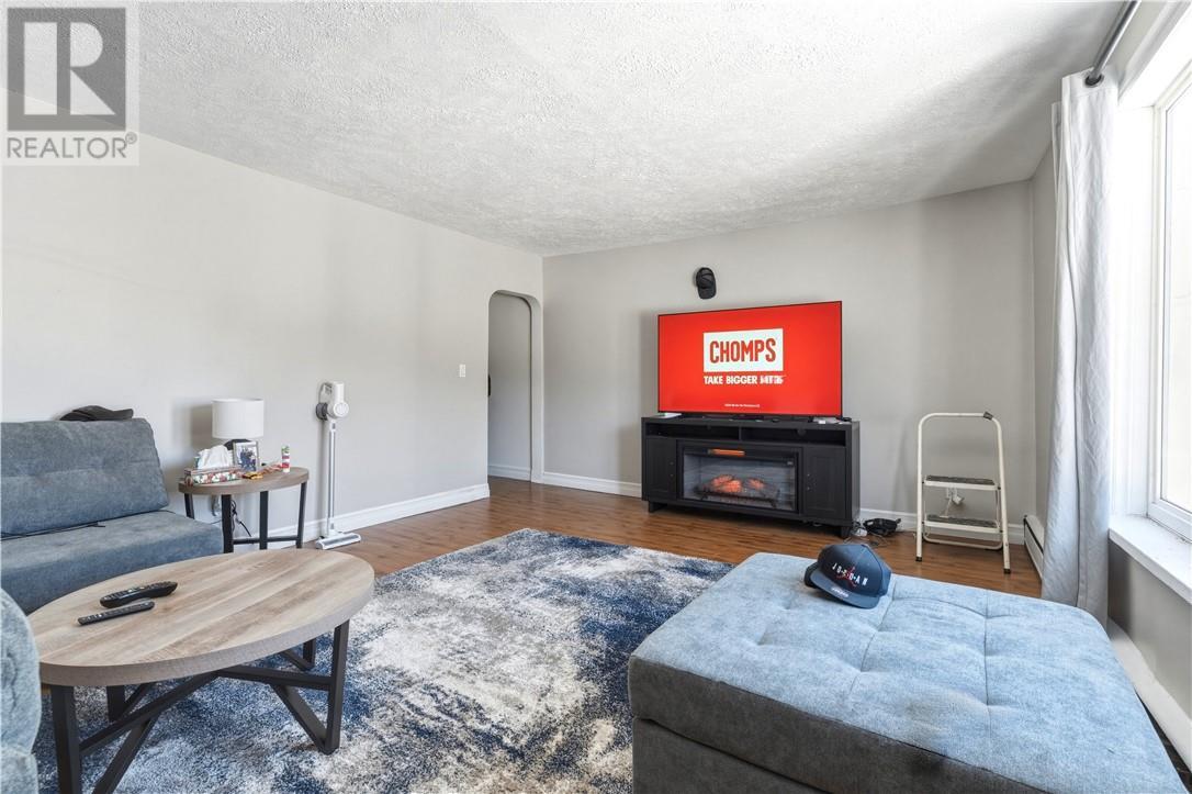 9 Second Avenue, Levack, ON - Indoor Photo Showing Living Room With Fireplace