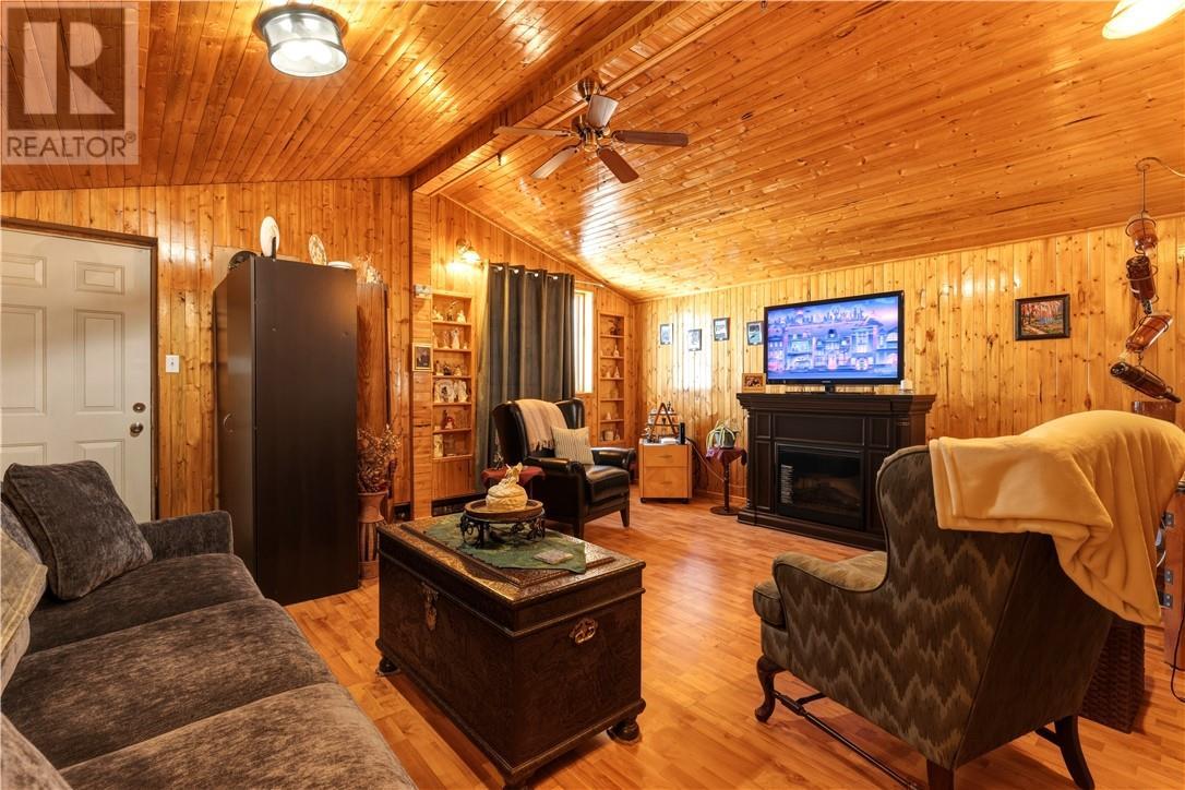 9 Second Avenue, Levack, ON - Indoor Photo Showing Living Room With Fireplace