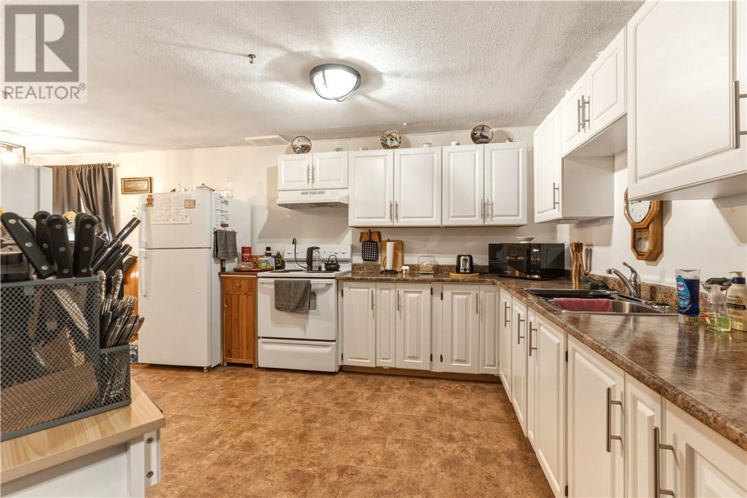 9 Second Avenue, Levack, ON - Indoor Photo Showing Kitchen With Double Sink