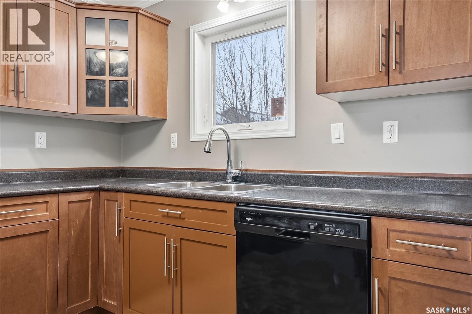 210 275 Pringle Lane, Saskatoon, SK - Indoor Photo Showing Kitchen With Double Sink