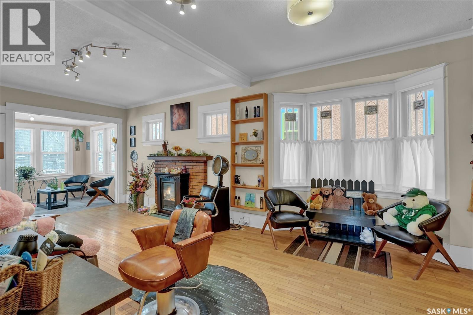 3230 13Th Avenue, Regina, SK - Indoor Photo Showing Living Room With Fireplace