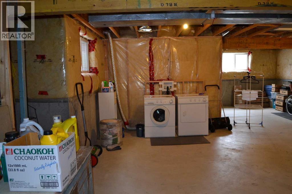 209 Lakeview Inlet, Chestermere, AB - Indoor Photo Showing Laundry Room
