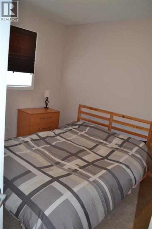 209 Lakeview Inlet, Chestermere, AB - Indoor Photo Showing Bedroom