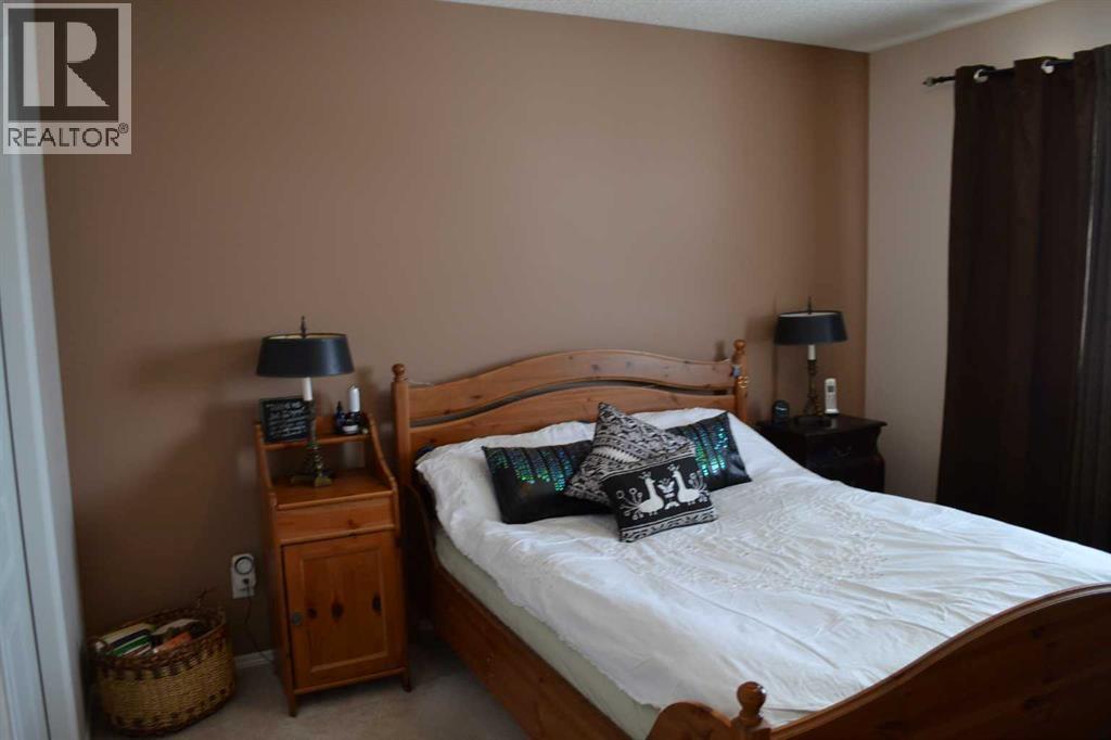 209 Lakeview Inlet, Chestermere, AB - Indoor Photo Showing Bedroom