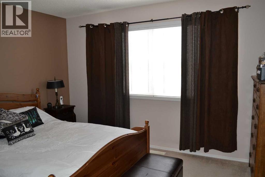 209 Lakeview Inlet, Chestermere, AB - Indoor Photo Showing Bedroom