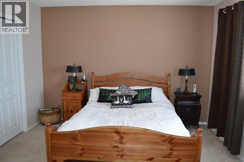209 Lakeview Inlet, Chestermere, AB - Indoor Photo Showing Bedroom