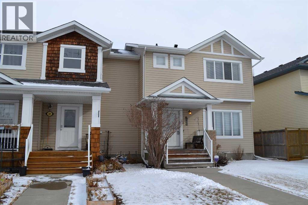 209 Lakeview Inlet, Chestermere, AB - Outdoor With Facade