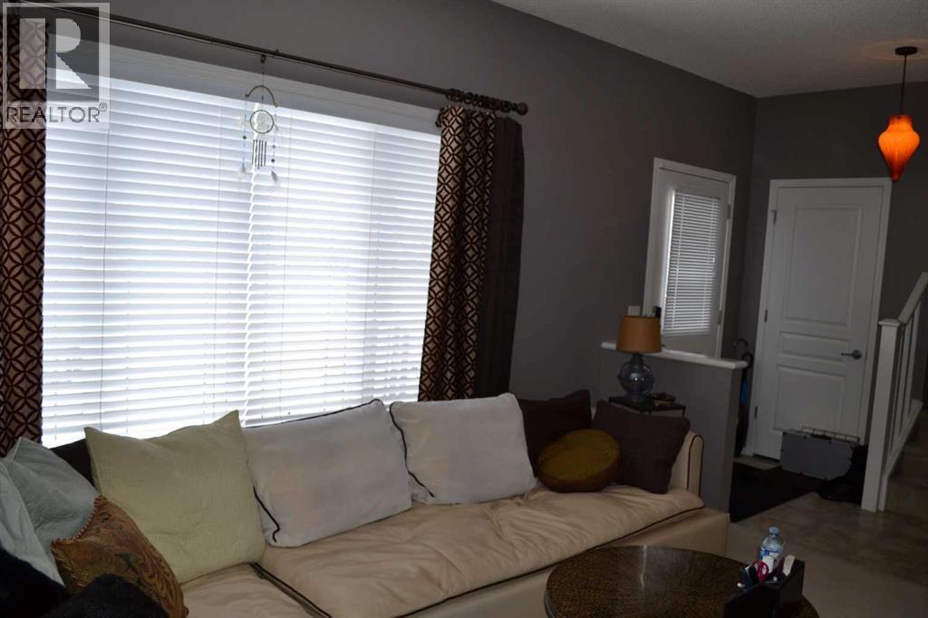 209 Lakeview Inlet, Chestermere, AB - Indoor Photo Showing Living Room