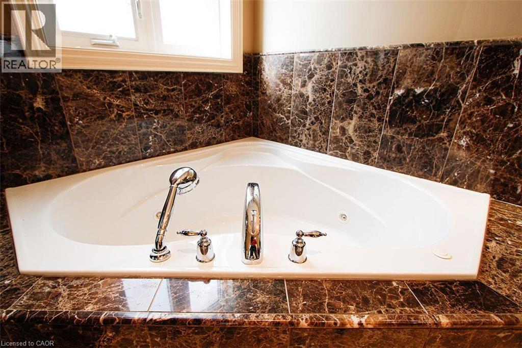Bathroom view of a bath - 205 Paige Place, Kitchener, ON - Indoor Photo Showing Bathroom