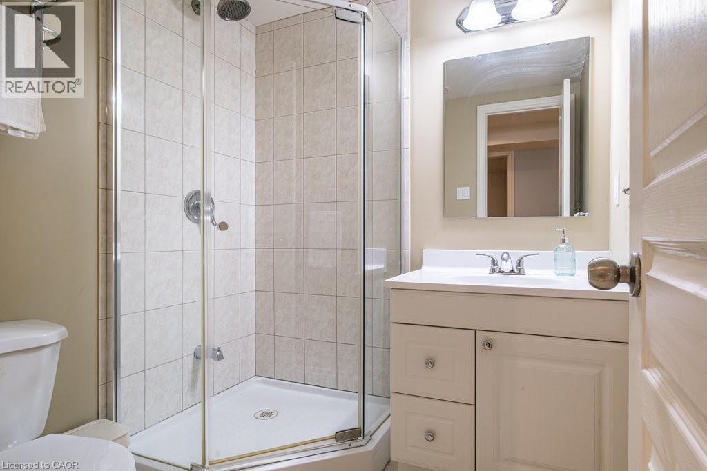 Full bathroom with a stall shower and vanity - 330 Strathcona Drive, Burlington, ON - Indoor Photo Showing Bathroom