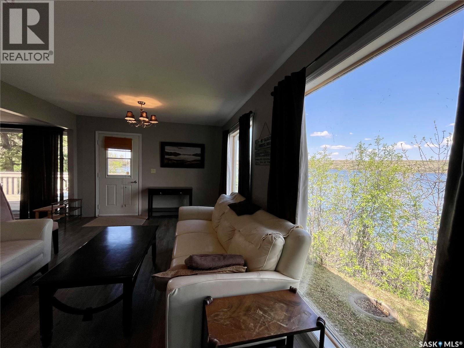 1220 Tatanka Drive, Sun Valley, SK - Indoor Photo Showing Living Room With Fireplace