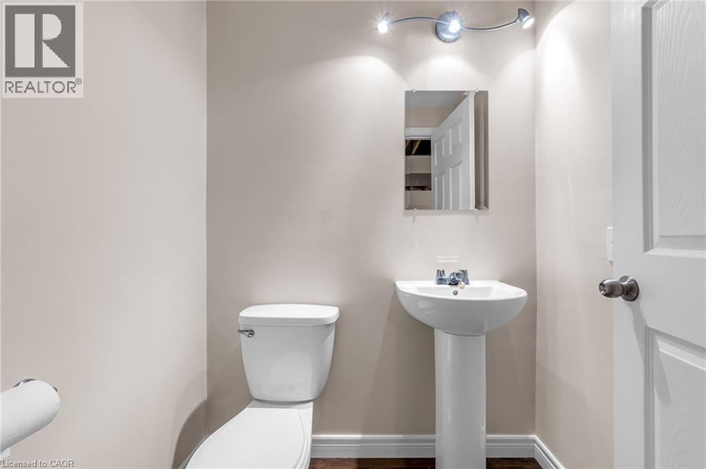 Bathroom featuring toilet and baseboards - 160 Wallace Avenue S, Welland, ON - Indoor Photo Showing Bathroom