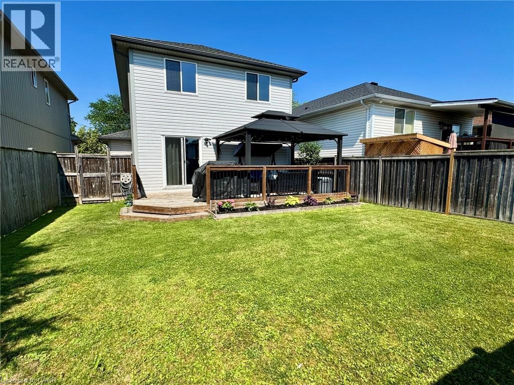 Rear view of property with a gazebo, a deck, and a fenced backyard - 160 Wallace Avenue S, Welland, ON - Outdoor With Deck Patio Veranda