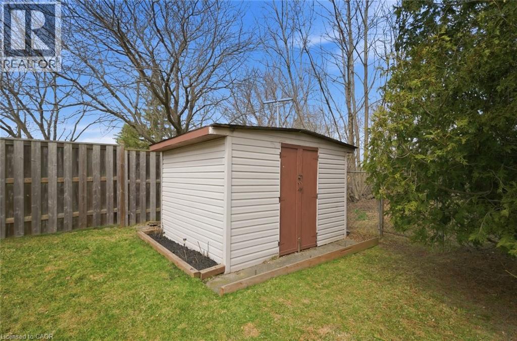 View of shed featuring a fenced backyard - 200 Morrison Drive, Caledonia, ON - Outdoor