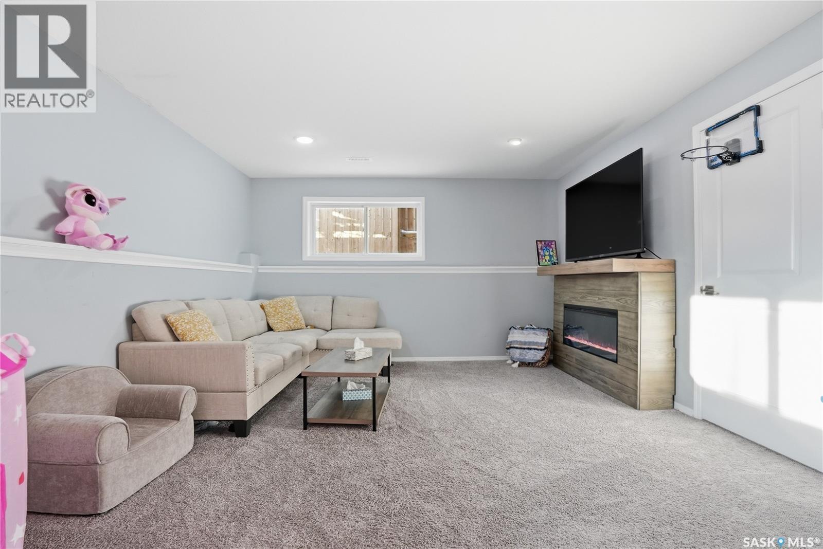 223 Eaton Crescent, Saskatoon, SK - Indoor With Fireplace