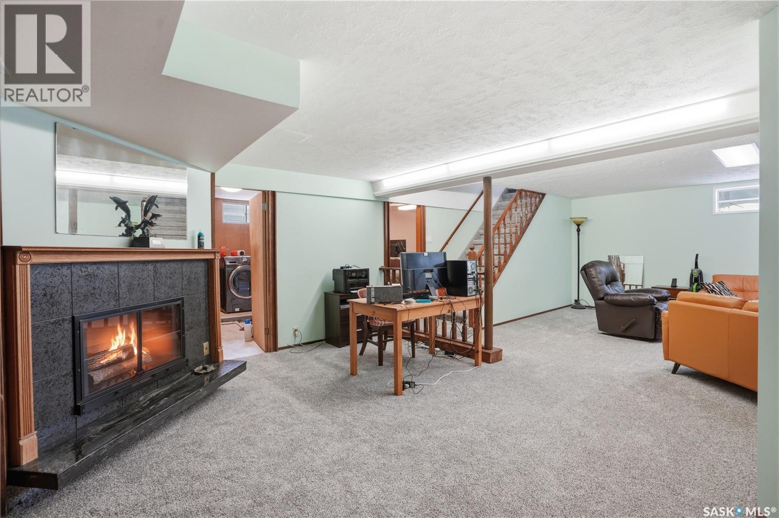 1011 Taylor Street E, Saskatoon, SK - Indoor With Fireplace