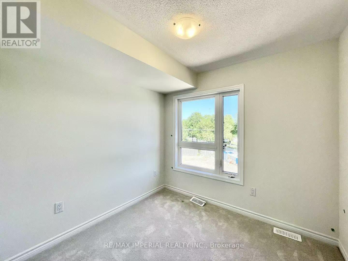 128 - 1081 Danforth Road, Toronto, ON - Indoor Photo Showing Other Room