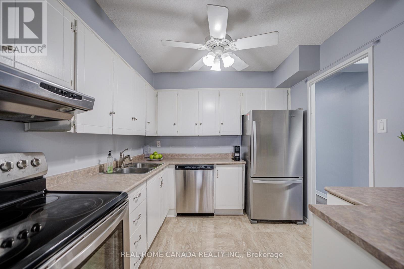 708 - 1359 White Oaks Boulevard, Oakville, ON - Indoor Photo Showing Kitchen With Stainless Steel Kitchen With Double Sink