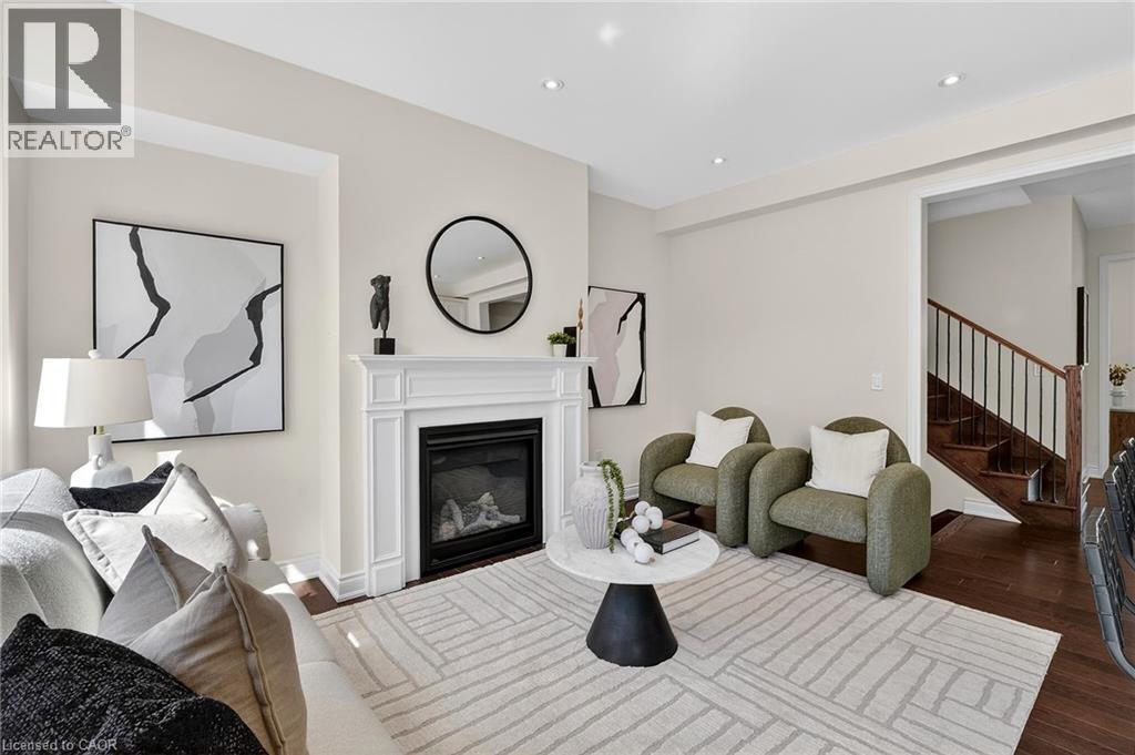 4 Beasley Grove, Ancaster, ON - Indoor Photo Showing Living Room With Fireplace
