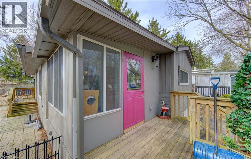 View of wooden deck - 580 Beaver Creek Road Unit# 11, Waterloo, ON - Outdoor With Deck Patio Veranda With Exterior