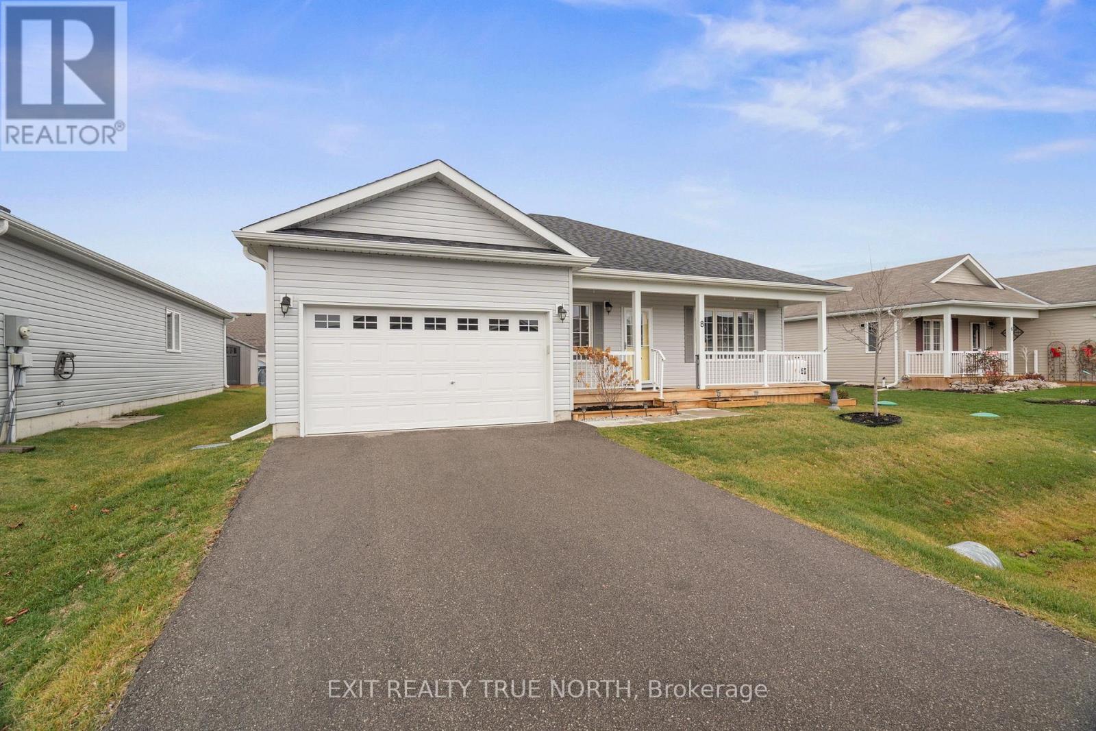 Adult lifestyle community of Lakepoint Village - 8 Sinclair Crescent, Ramara, ON - Outdoor With Deck Patio Veranda With Facade