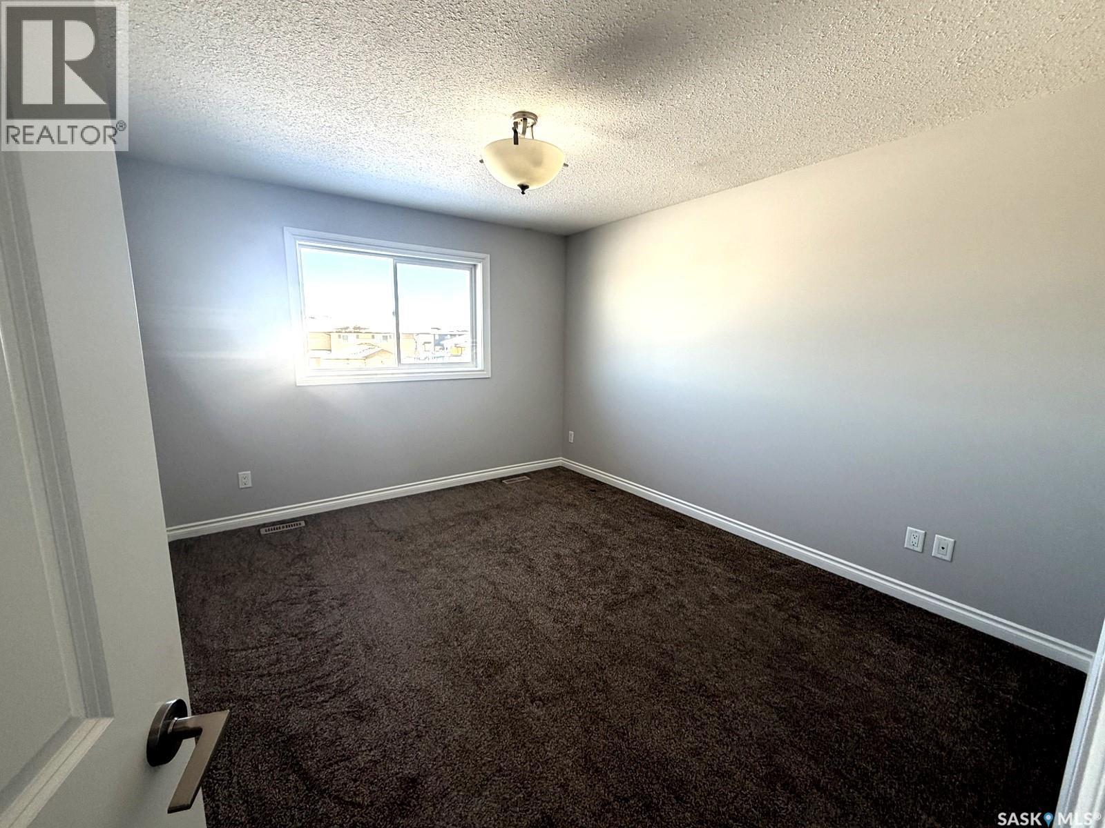 103 Plains Circle, Pilot Butte, SK - Indoor Photo Showing Other Room