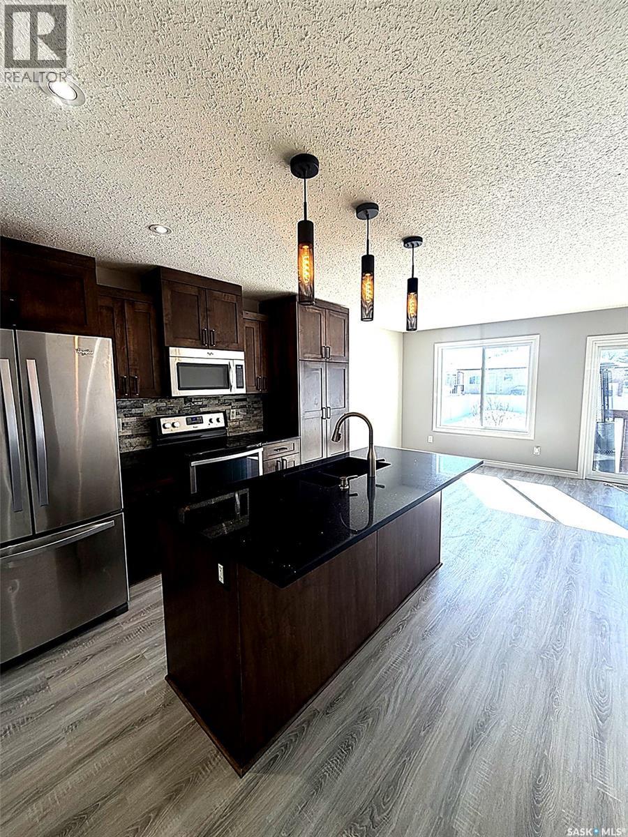 103 Plains Circle, Pilot Butte, SK - Indoor Photo Showing Kitchen