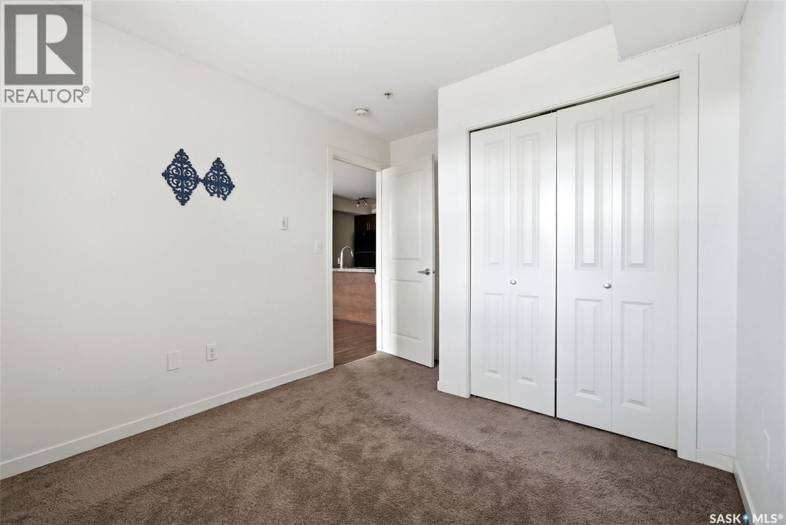 1106 5500 Mitchinson Way, Regina, SK - Indoor Photo Showing Other Room