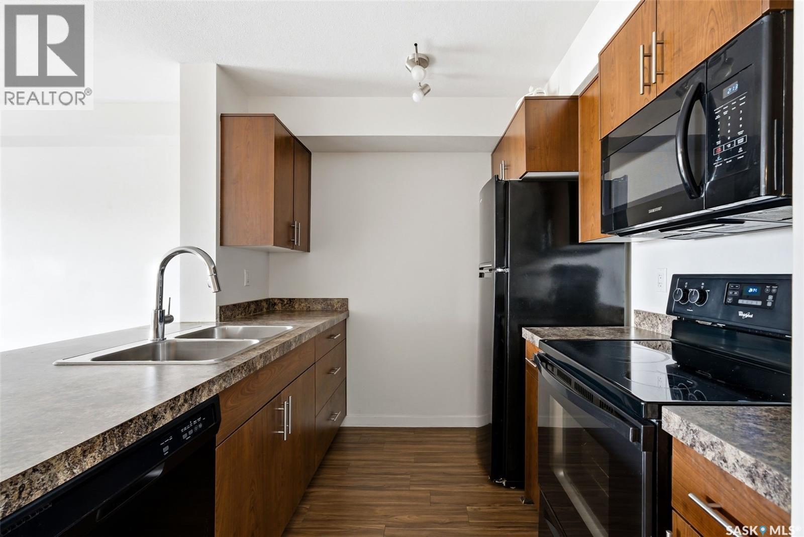 1106 5500 Mitchinson Way, Regina, SK - Indoor Photo Showing Kitchen With Double Sink