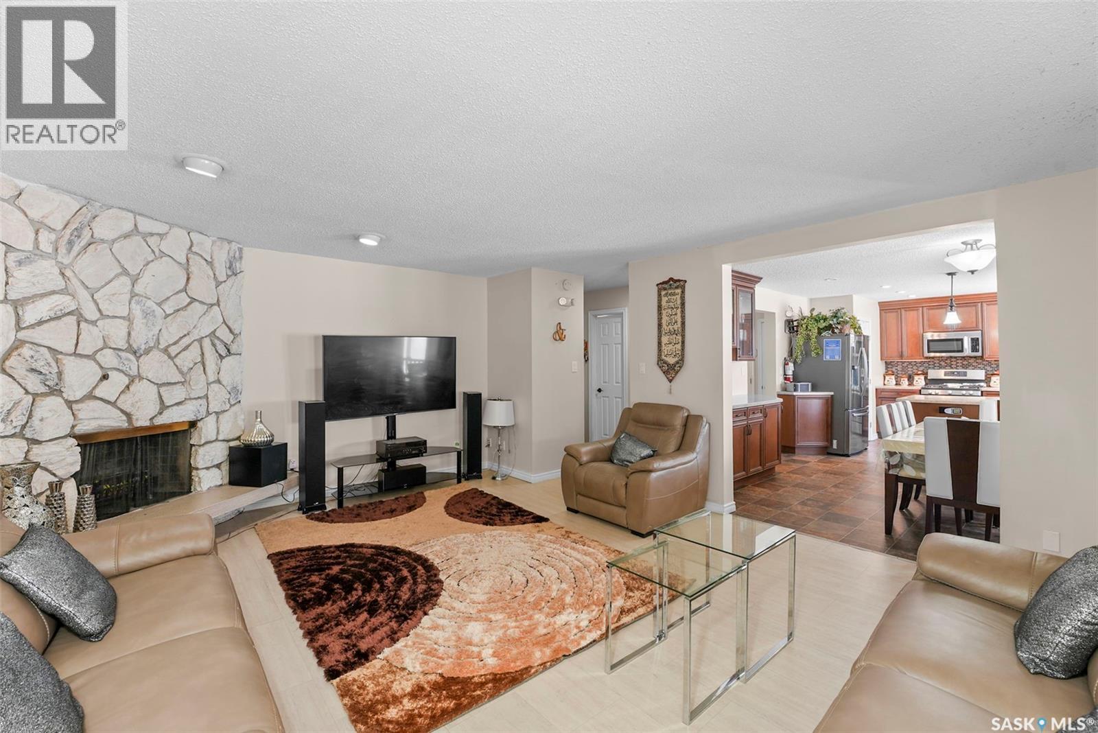 55 Noonan Road, Regina, SK - Indoor Photo Showing Living Room With Fireplace