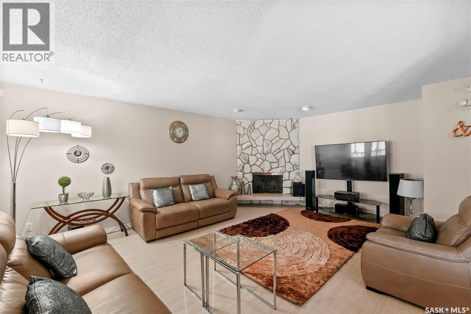 55 Noonan Road, Regina, SK - Indoor Photo Showing Living Room With Fireplace