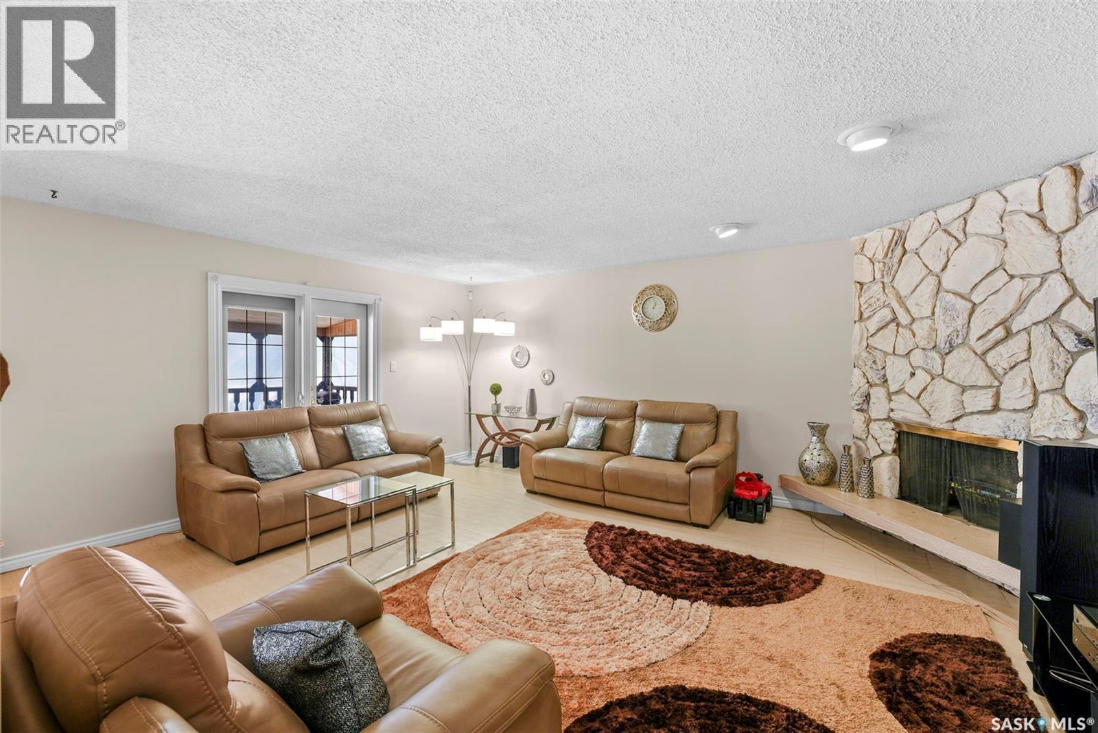 55 Noonan Road, Regina, SK - Indoor Photo Showing Living Room With Fireplace