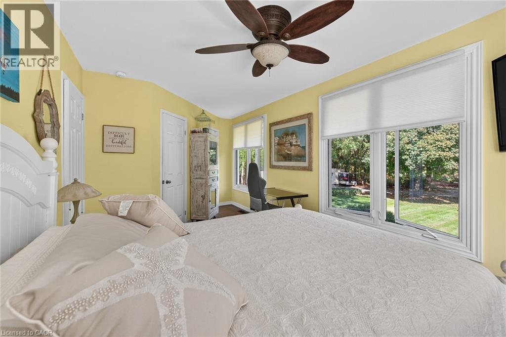 Bedroom with ceiling fan - 5590 Blind Line, Burlington, ON - Indoor Photo Showing Bedroom