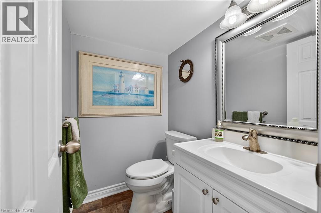 Bathroom with vanity and toilet - 5590 Blind Line, Burlington, ON - Indoor Photo Showing Bathroom