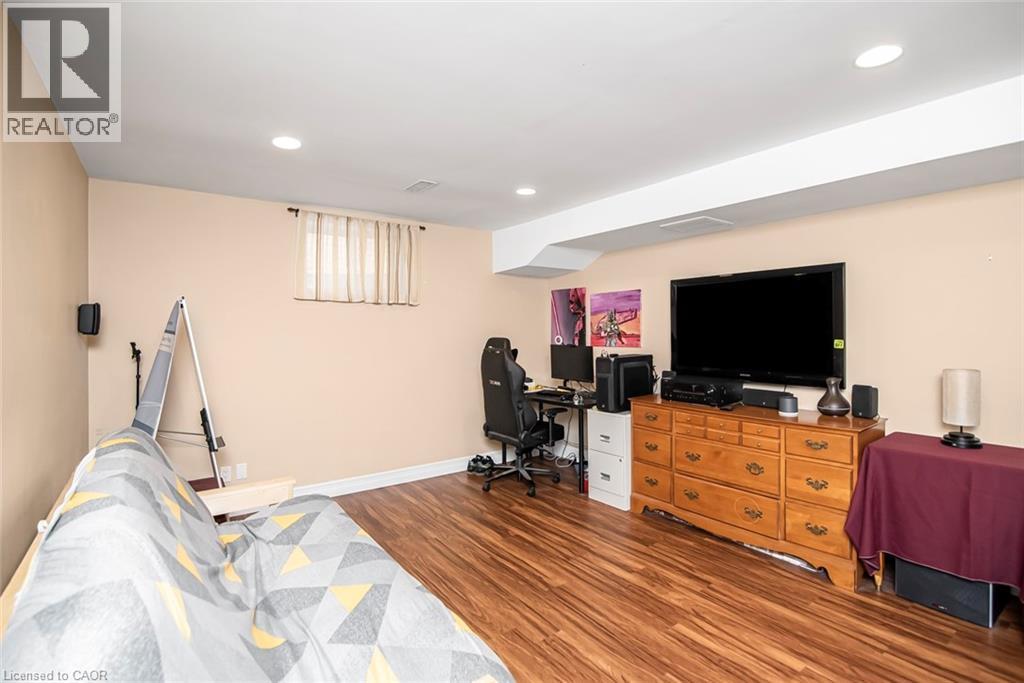 Home office with light wood-style floors and recessed lighting - 40 Artistic Boulevard, Hamilton, ON - Indoor