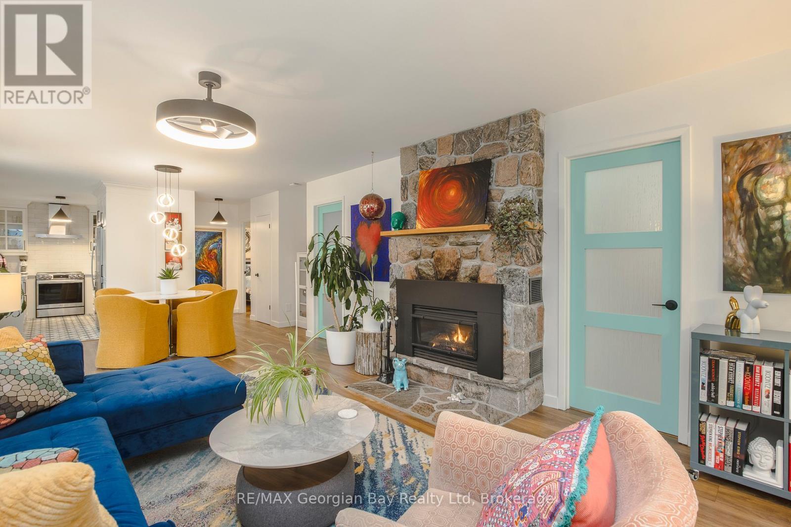 2 Belle Vue Avenue, Tiny, ON - Indoor Photo Showing Living Room With Fireplace
