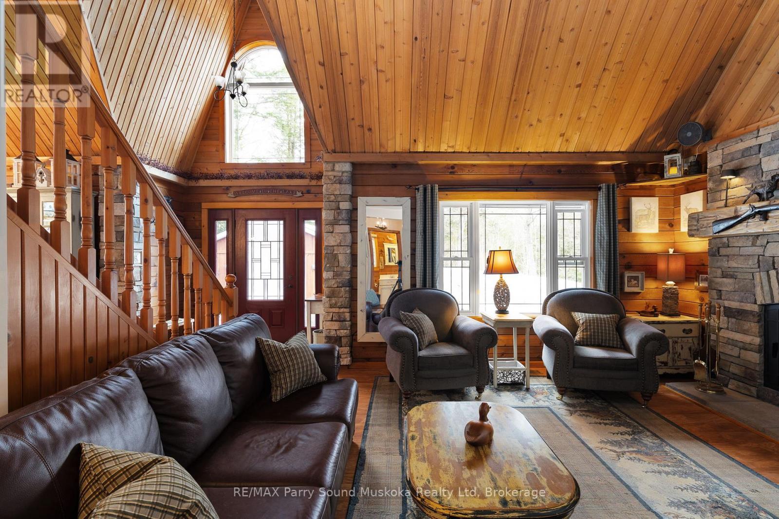 6 West Point Drive, Mckellar, ON - Indoor Photo Showing Living Room With Fireplace