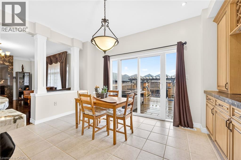 Dining area with walkout to deck - 182 Irwin Avenue, Hamilton, ON - Indoor Photo Showing Dining Room