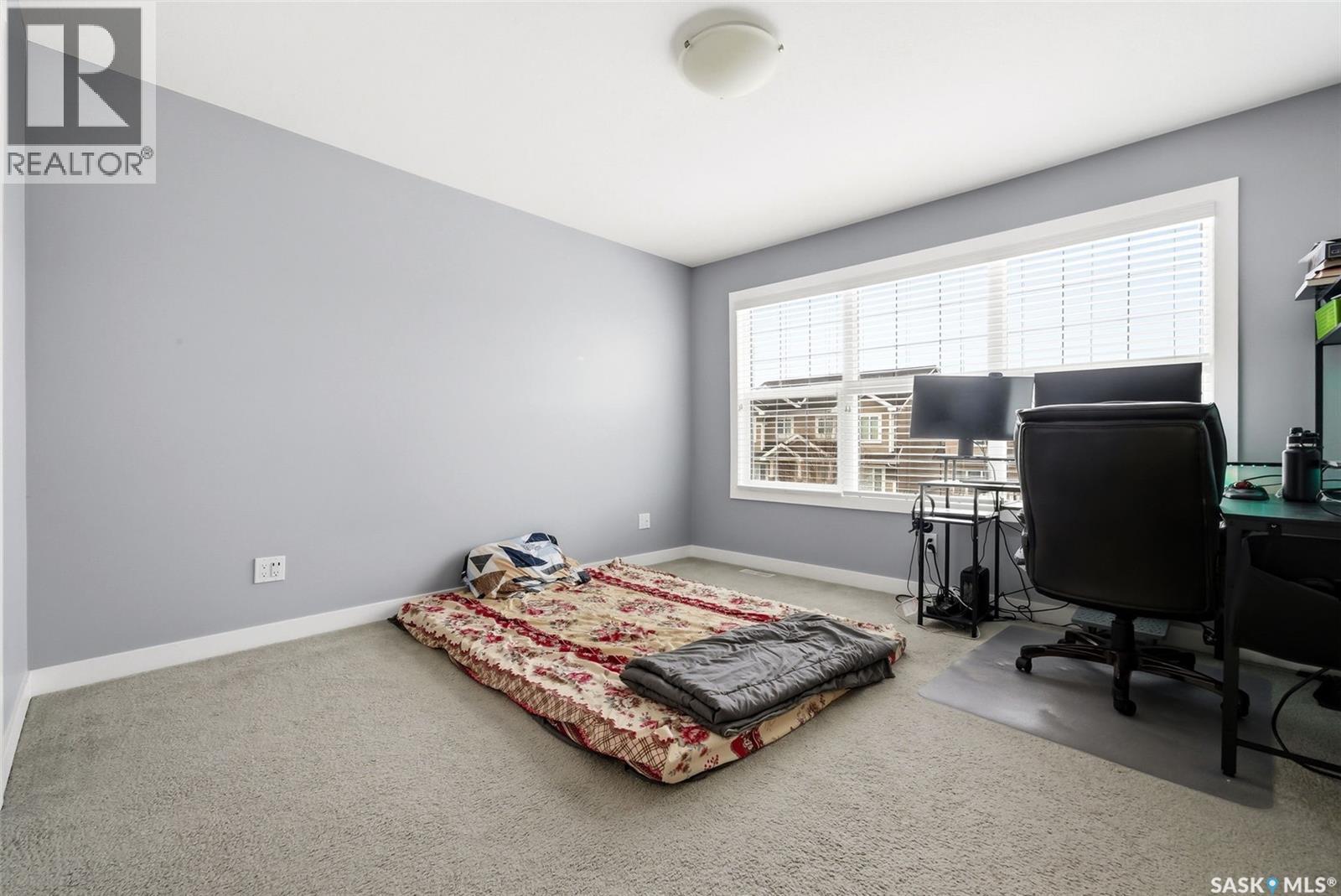 4609 Green Rock Road E, Regina, SK - Indoor Photo Showing Bedroom