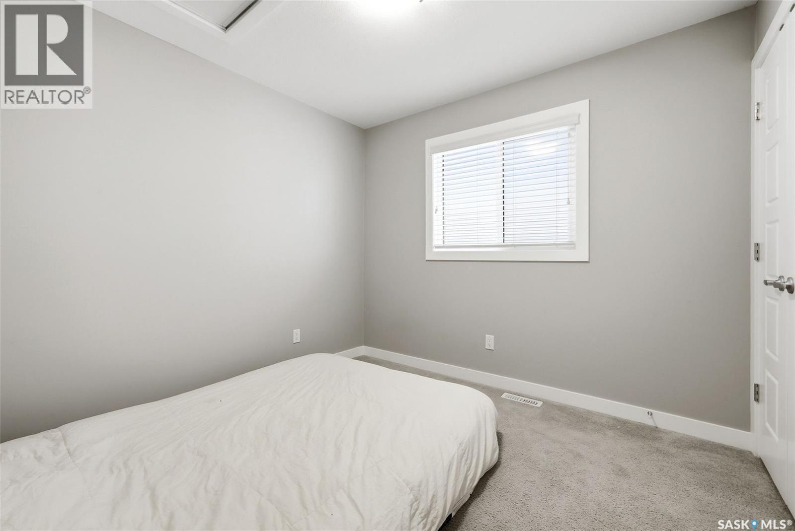 4609 Green Rock Road E, Regina, SK - Indoor Photo Showing Bedroom