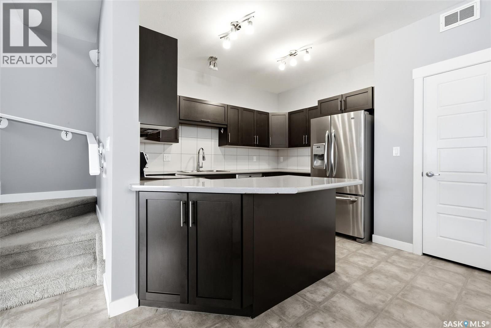 4609 Green Rock Road E, Regina, SK - Indoor Photo Showing Kitchen With Stainless Steel Kitchen