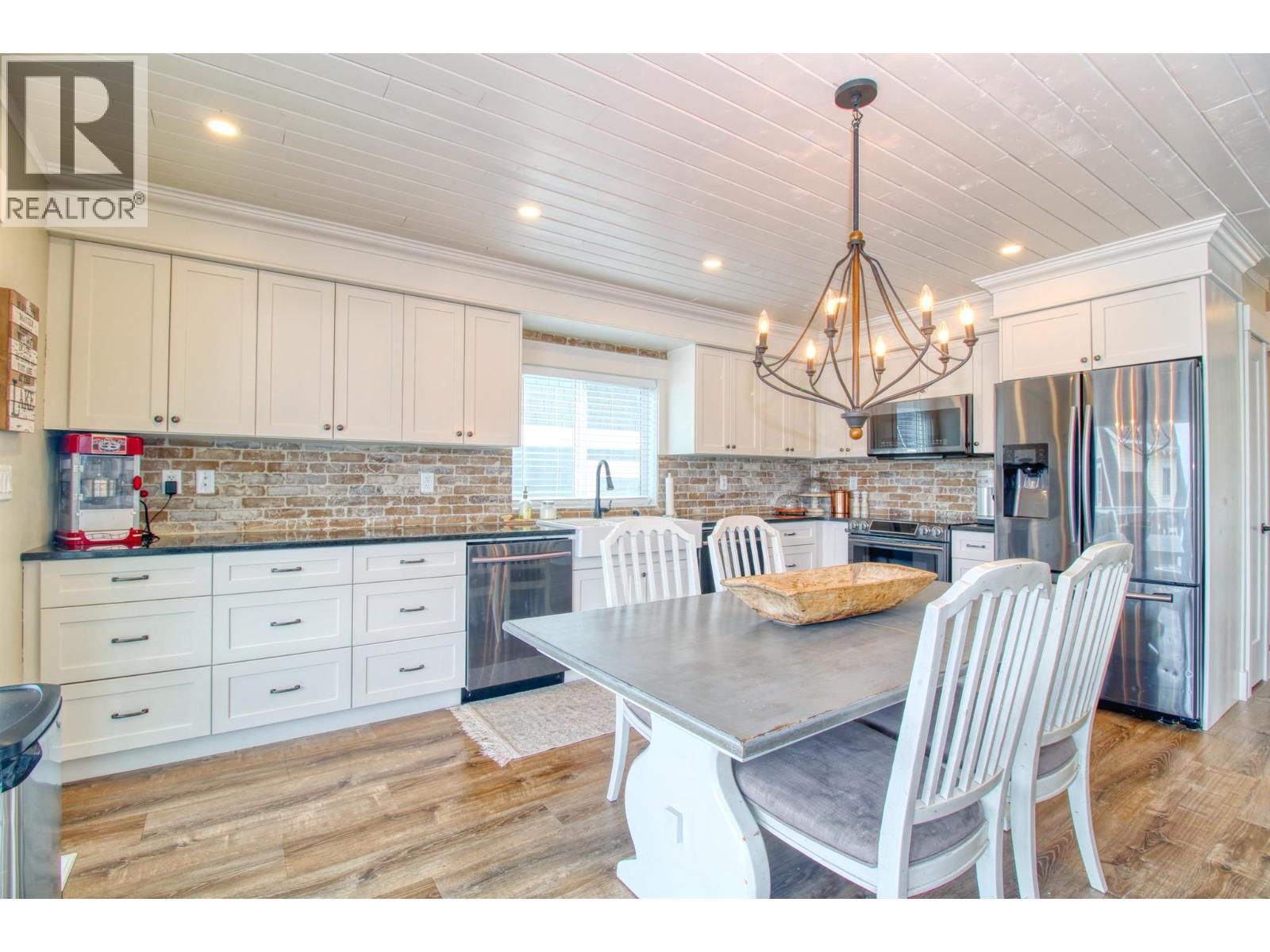 6746 Marbella Loop Unit# 304, Kelowna, BC - Indoor Photo Showing Dining Room