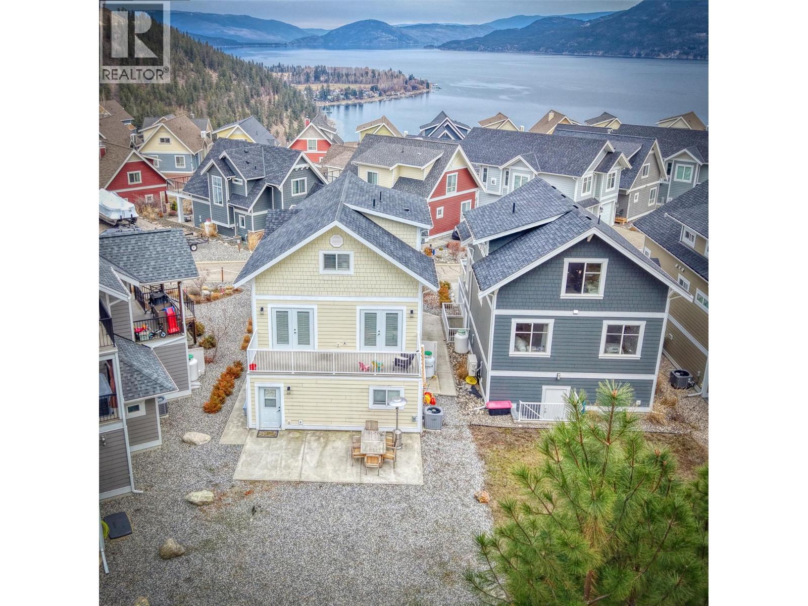 6746 Marbella Loop Unit# 304, Kelowna, BC - Outdoor With Body Of Water With Facade