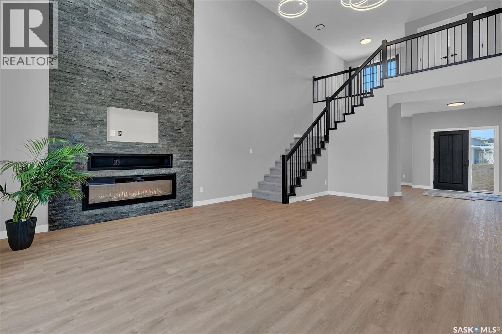 4327 Wild Rose Drive, Regina, SK - Indoor With Fireplace