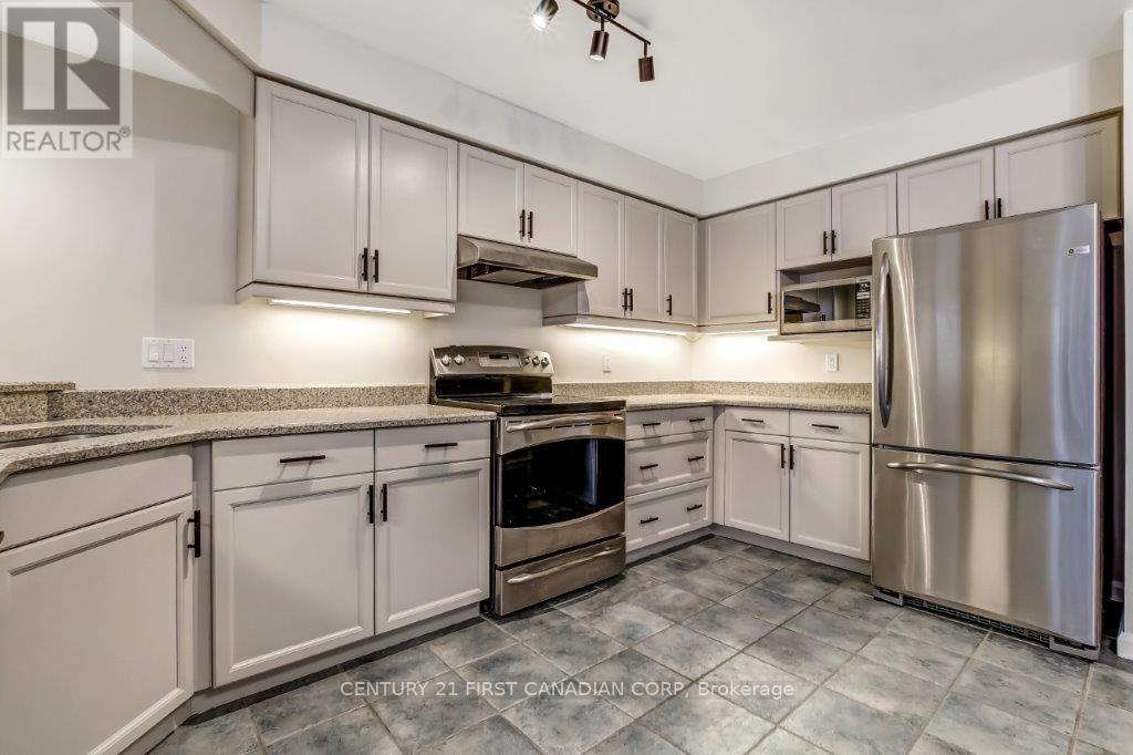 An abundance of cabinetry and counter space - 2 - 609 Colborne Street, London East (East F), ON - Indoor Photo Showing Kitchen