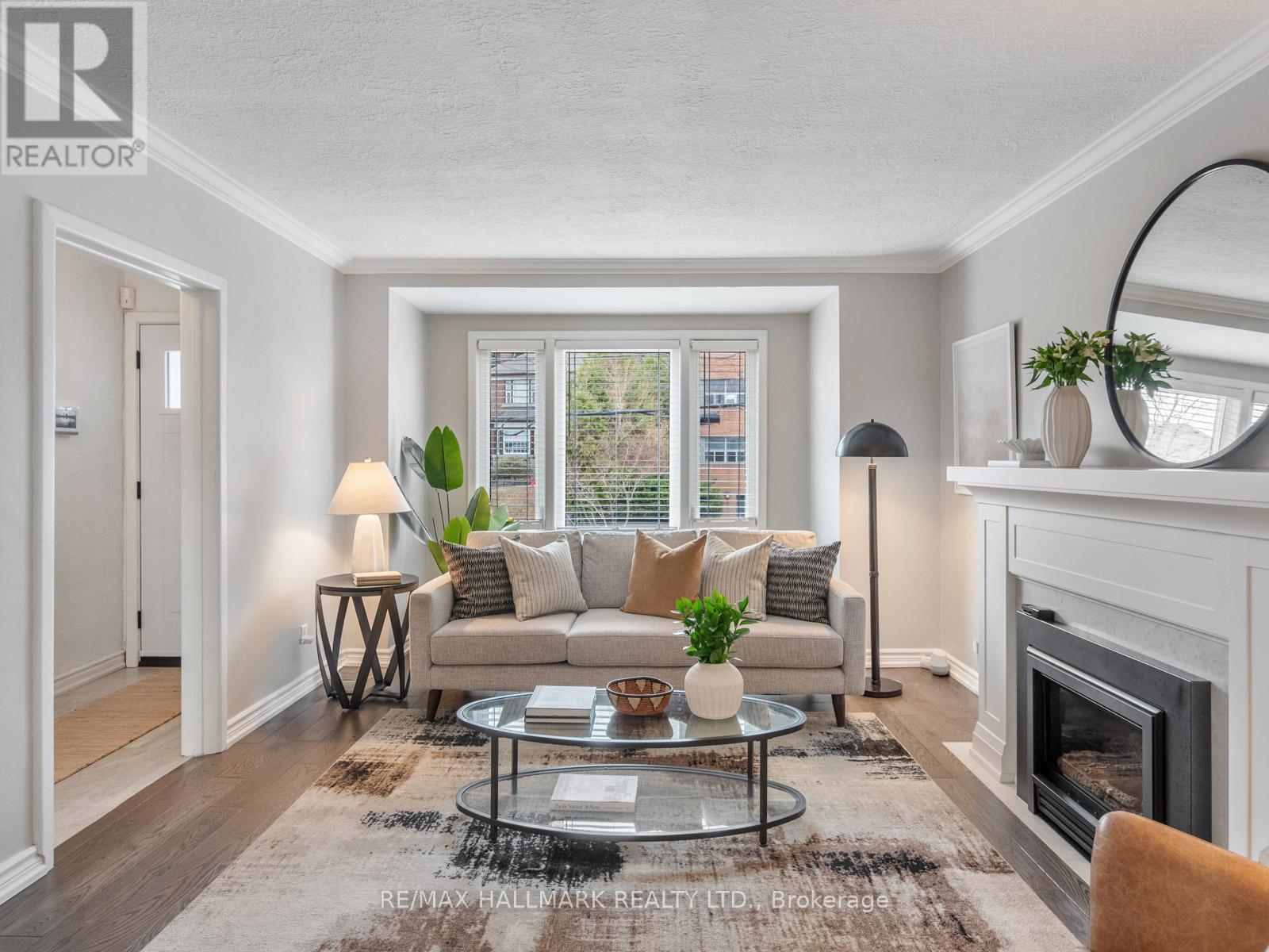 8 Glenvale Boulevard, Toronto, ON - Indoor Photo Showing Living Room With Fireplace