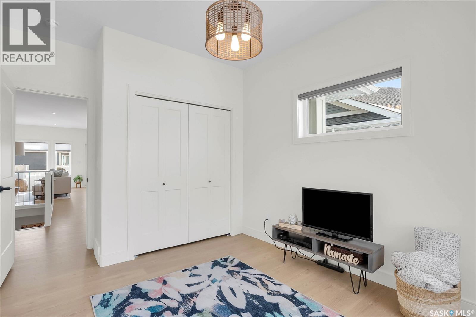 9 437 Palmer Crescent, Warman, SK - Indoor Photo Showing Bedroom