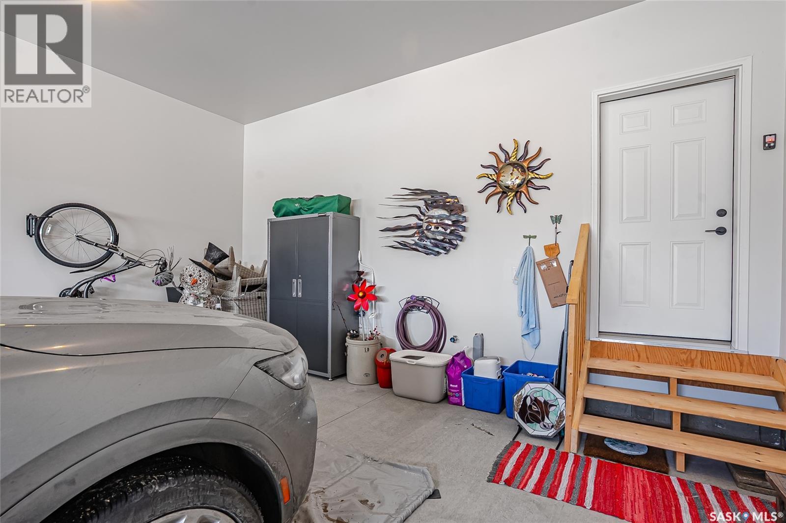 9 437 Palmer Crescent, Warman, SK - Indoor Photo Showing Laundry Room